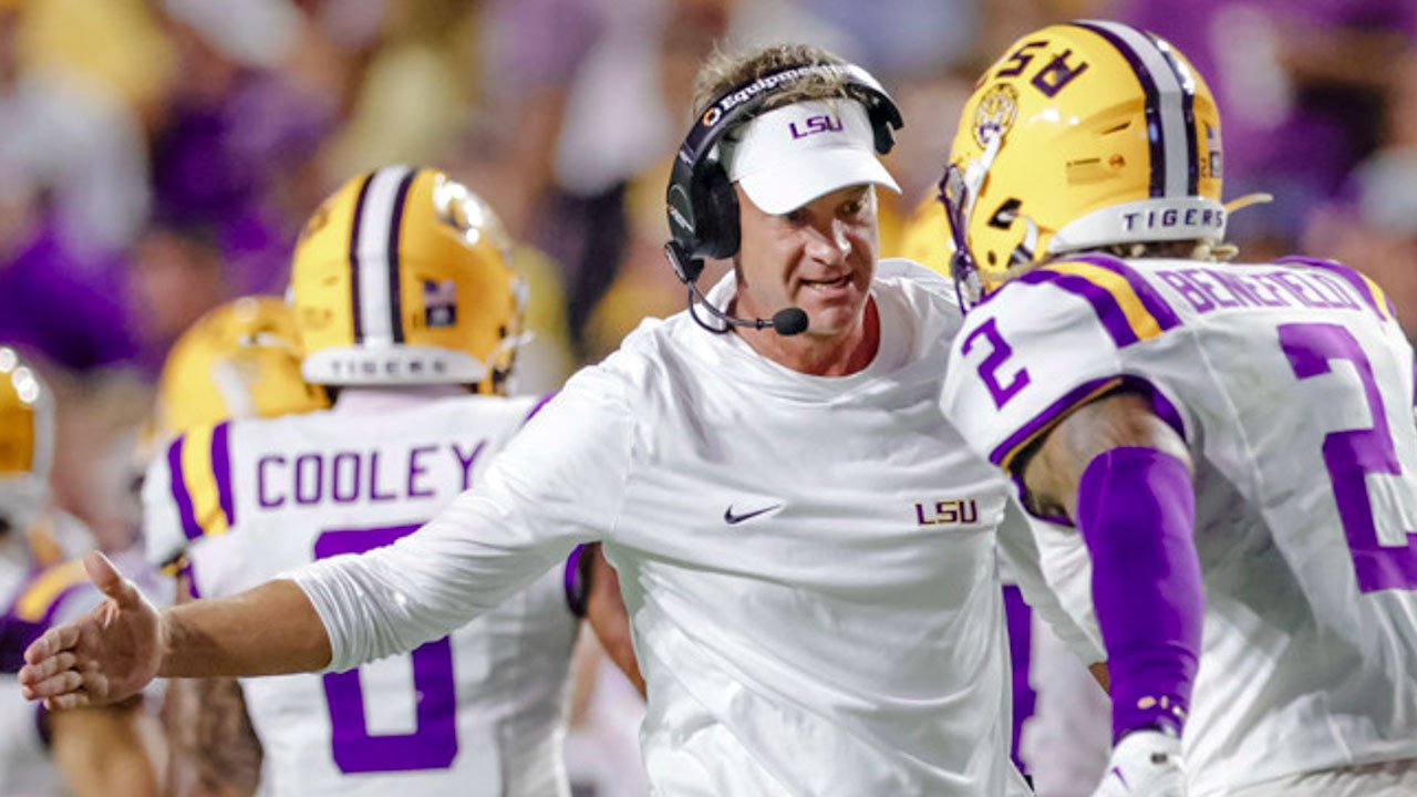 COLLEGE FOOTBALL: SEP 26 Texas A&M at LSU LSU Tigers coach Lane Kiffin celebrates with Ty Benefield after a defensive stop against the Texas A&M Aggies during the second half of a game at Tiger Stadium